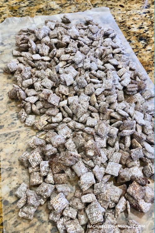 Gluten and Dairy-free Puppy Chow - Muddy Buddies - Transfer the puppy chow out onto a sheet of wax or parchment paper to cool