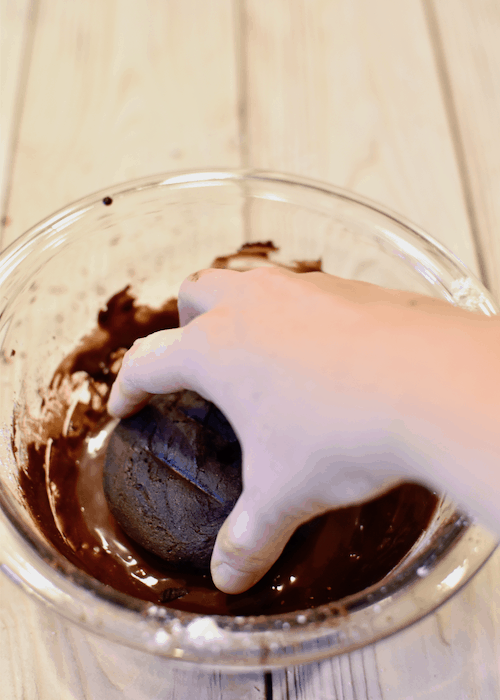 Gluten-free Brownies (Dairy-free, Vegan) - dipping in glaze