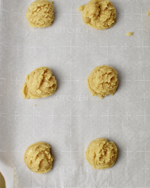 Gluten-free Thumbprint Cookies - Scooping Cookies: Scoop the thumbprint cookie dough