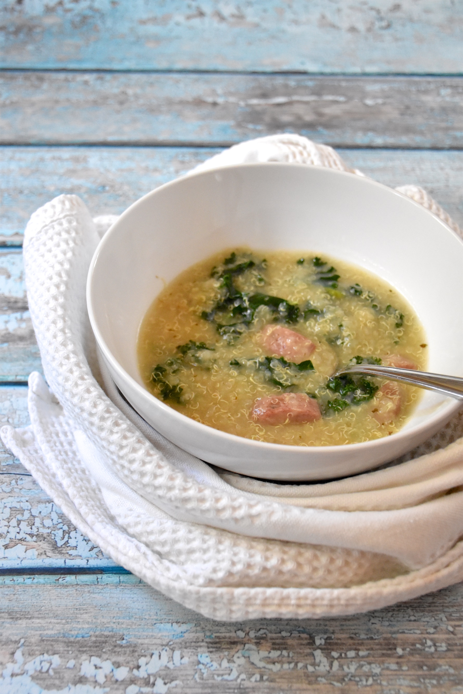 If you love your instant pot and eating healthy, you'll love this gluten-free dairy-free sausage, kale, and quinoa soup recipe! Click through for the full post on RachaelRoehmholdt.com